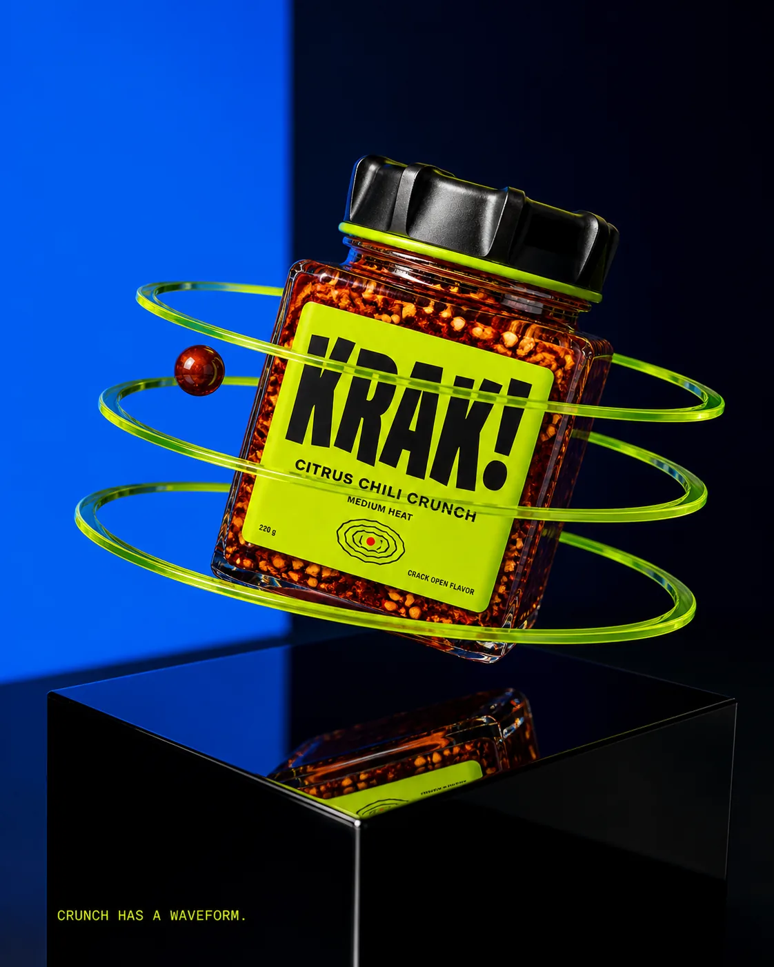 Frasco KRAK! rodeado por líneas orbitales sobre fondo azul